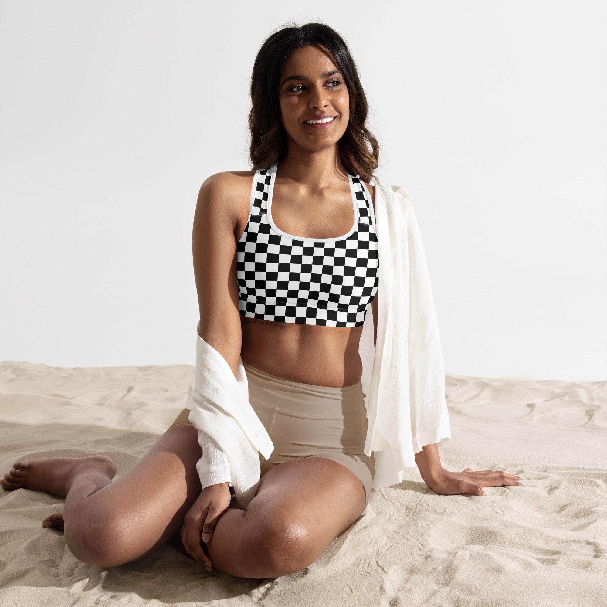 Women’s black and white checkerboard padded sports bra with racerback design buttery soft supportive quick dry