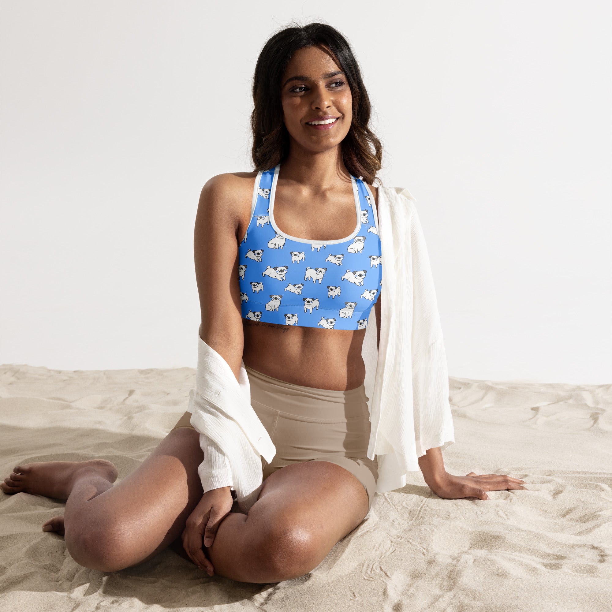 Women’s blue padded sports bra with white pug dog prints buttery soft supportive quick-dry material