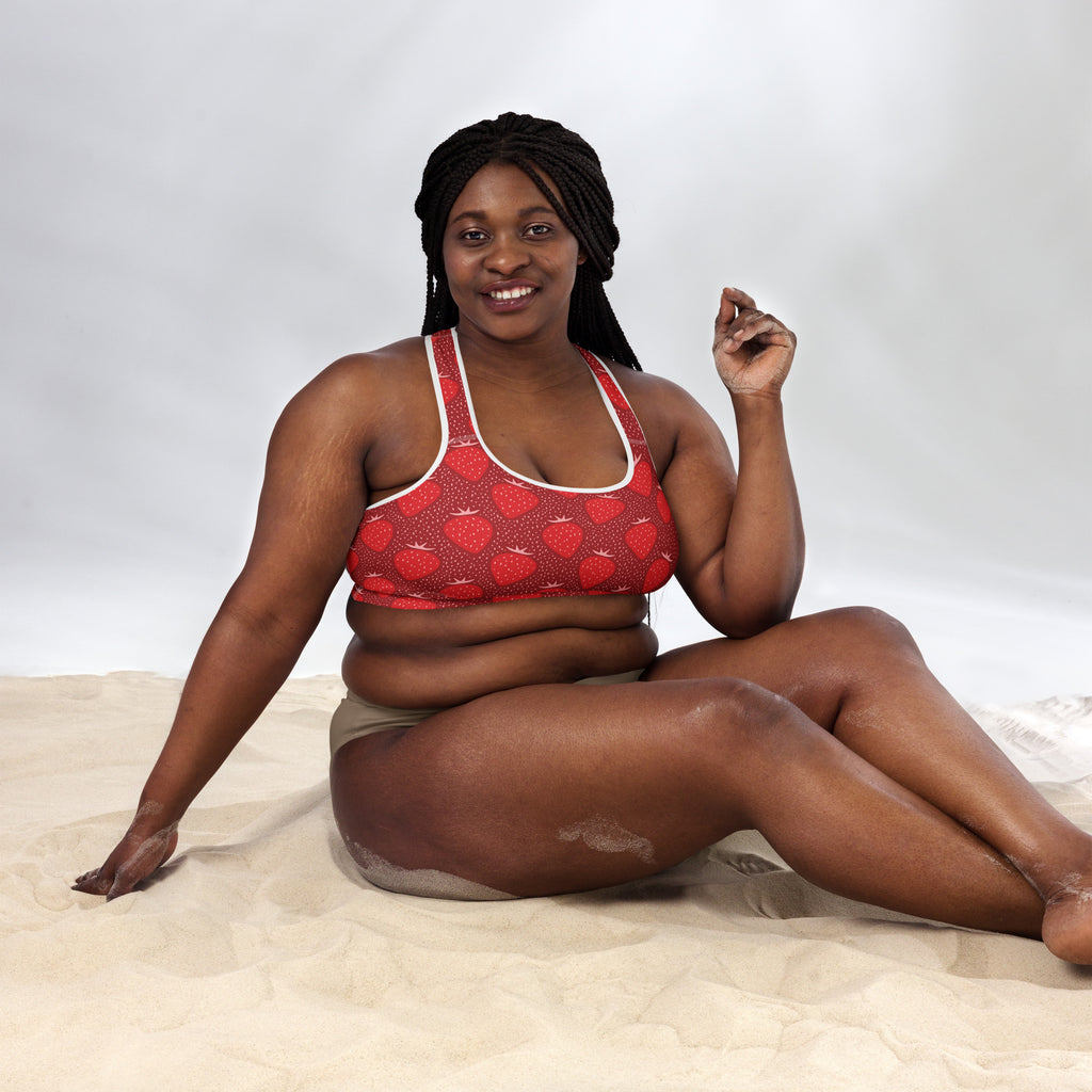 Women’s red strawberry padded sports bra with white trim buttery soft supportive and quick-dry material
