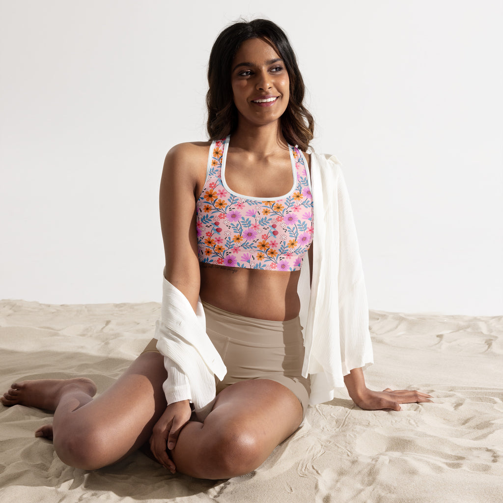 Women’s pink floral print padded sports bra with white trim buttery soft supportive and quick-dry fabric