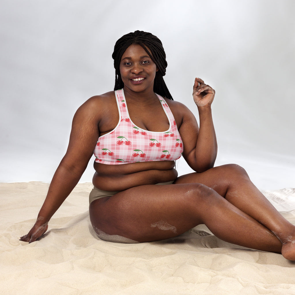 Women’s pink gingham cherry padded sports bra with buttery soft fabric supportive fit and quick-dry material