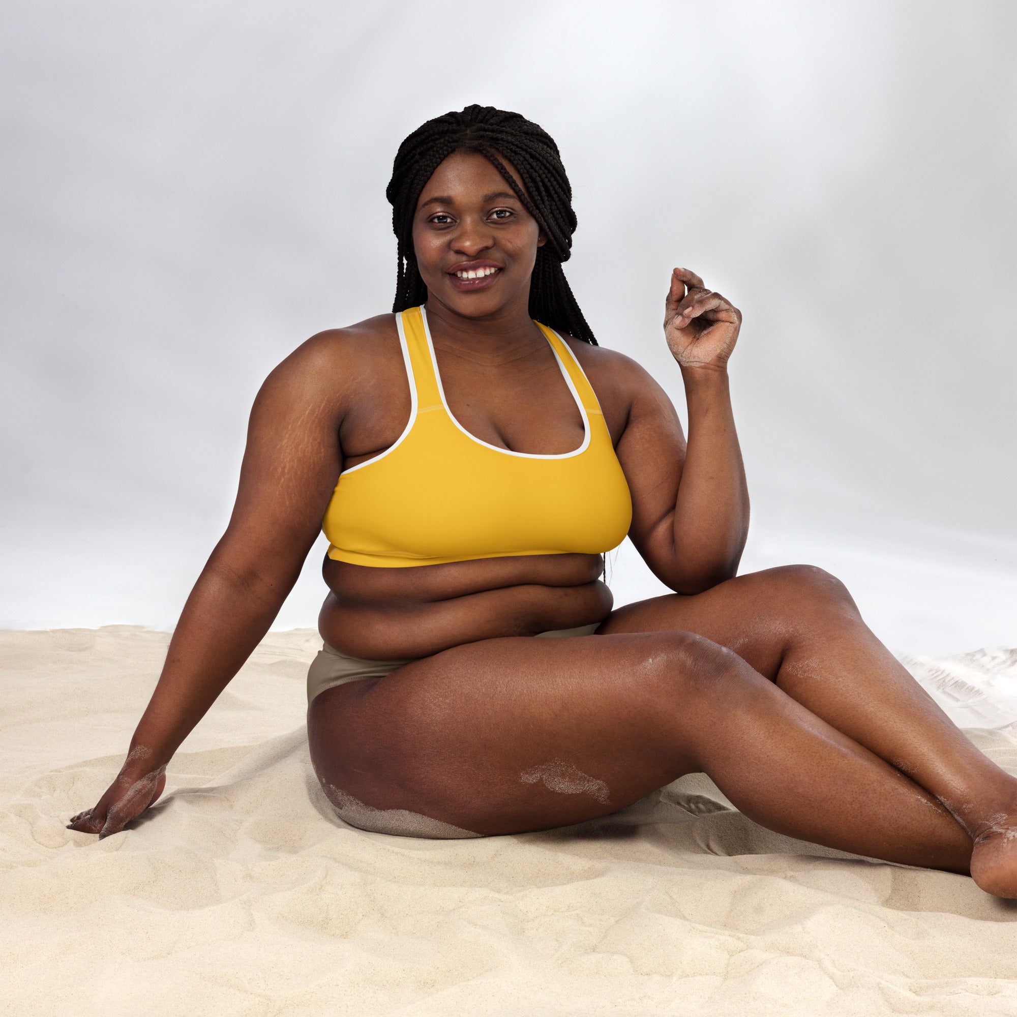 Yellow padded sports bra with white trim buttery soft supportive quick-dry fabric for women