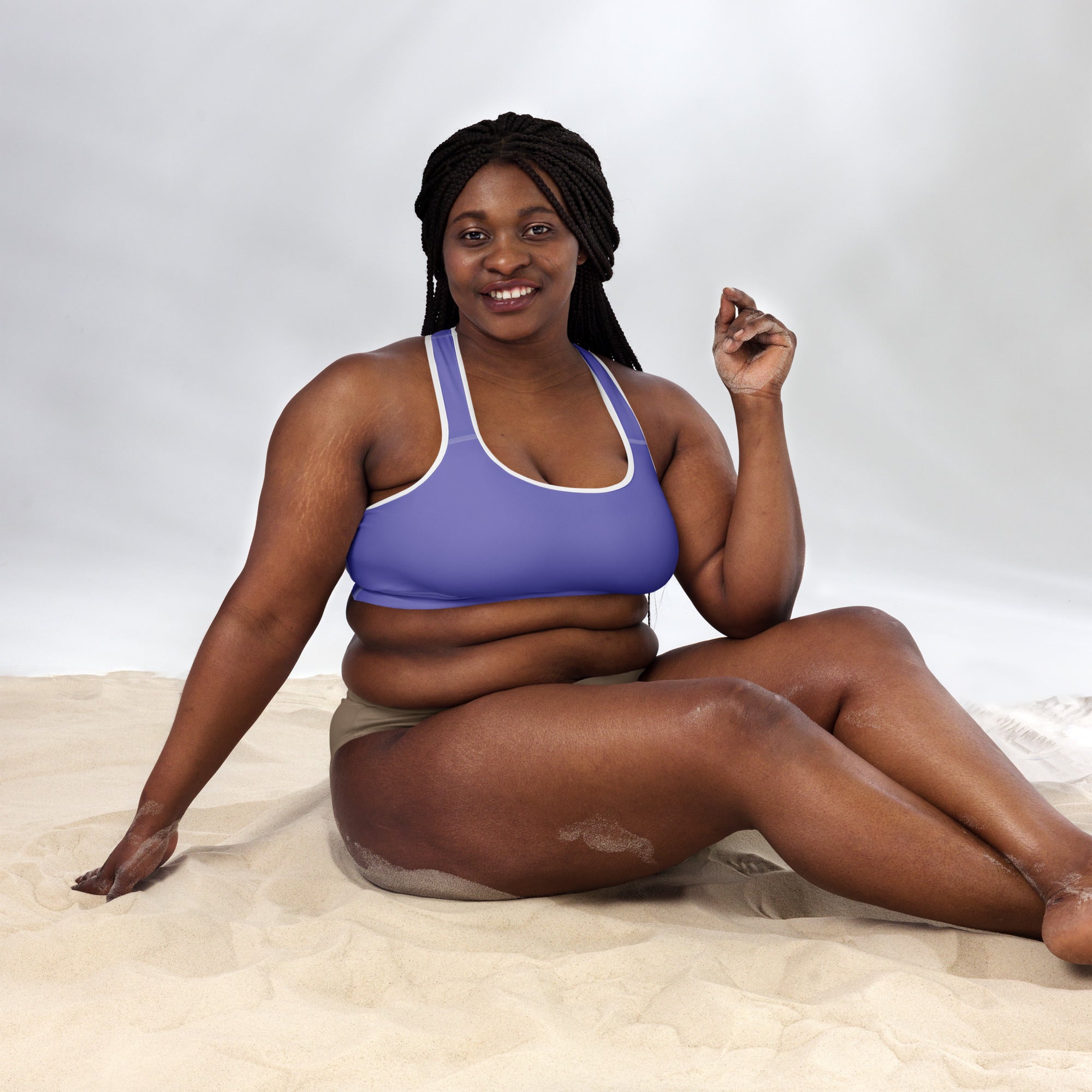 Women’s purple padded sports bra with white trim is buttery soft, supportive, and quick-dry for active wear