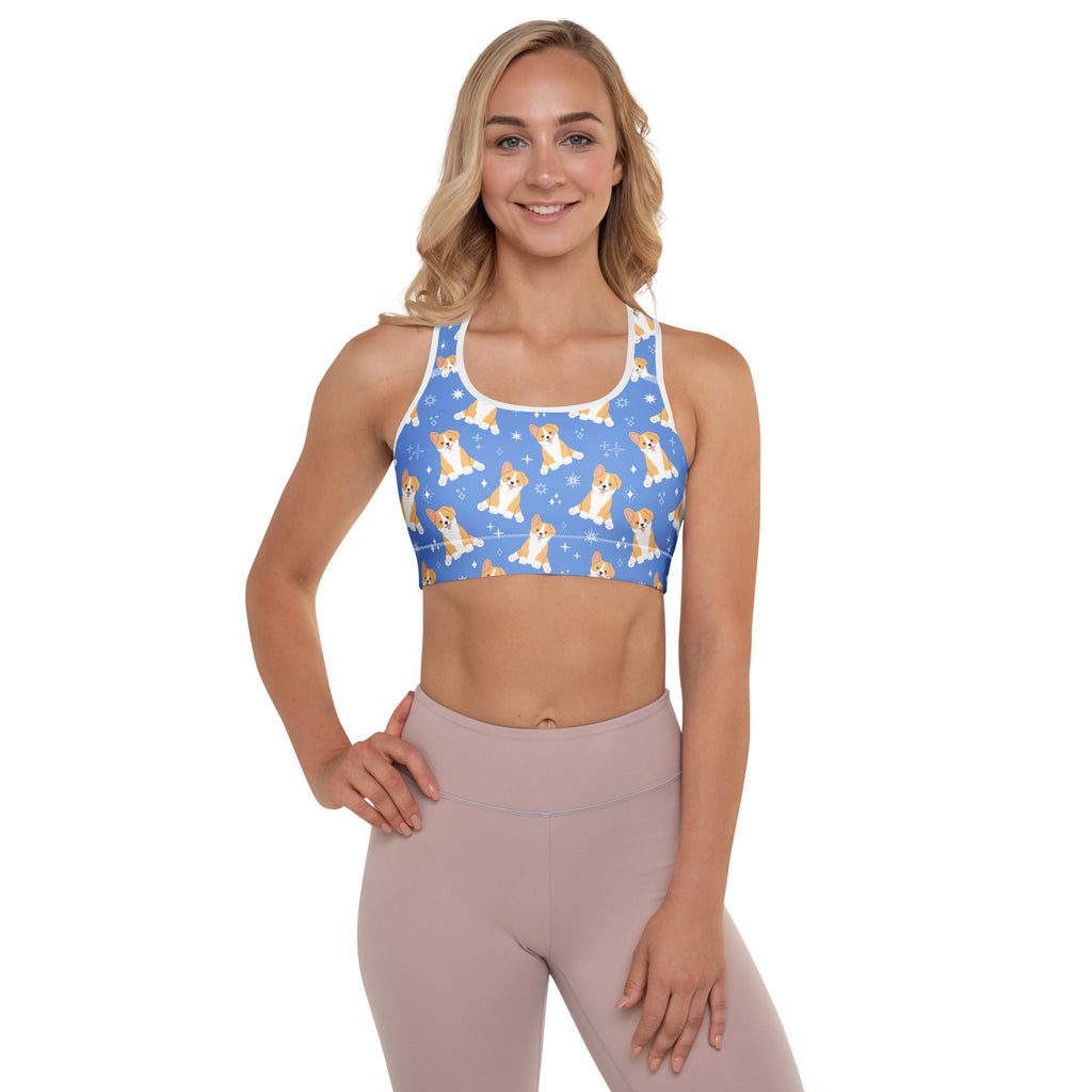 Women’s blue padded sports bra with tan corgi dog pattern and white snowflake accents buttery soft supportive quick-dry