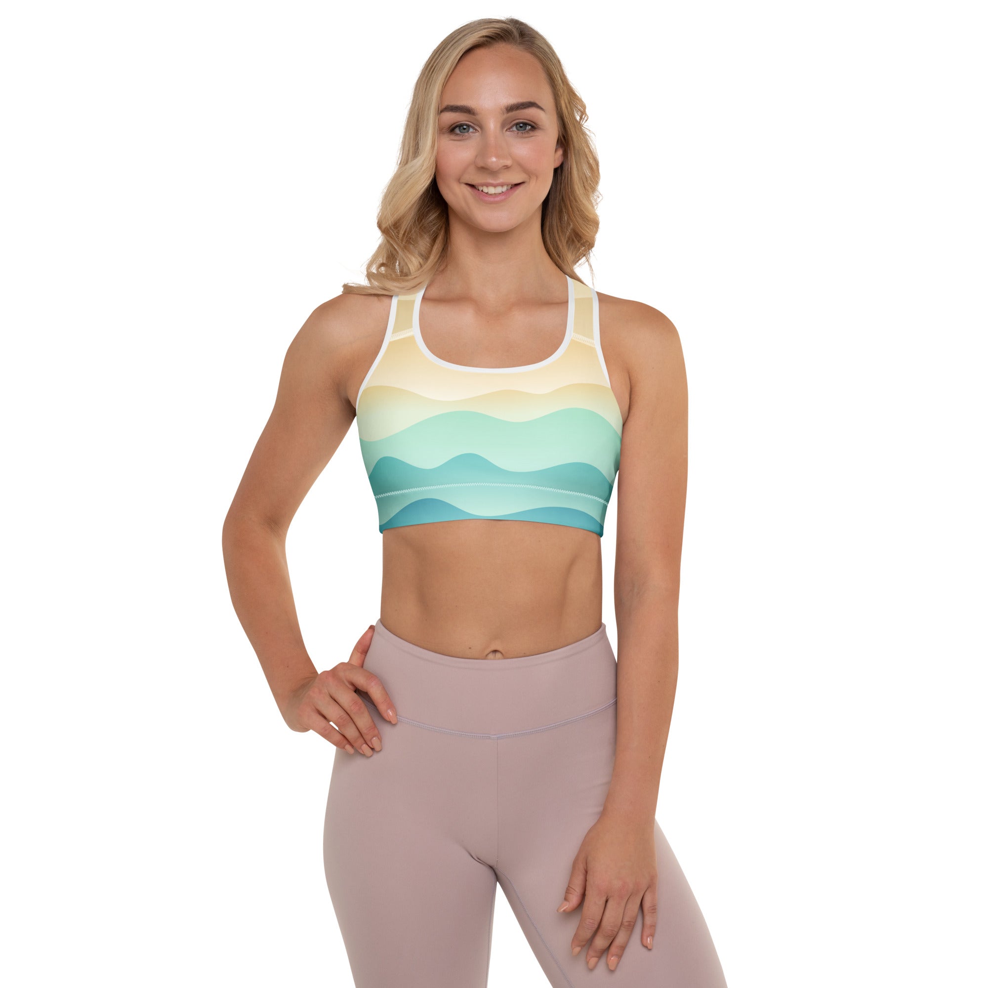 Women’s pastel ocean wave padded sports bra in soft yellow mint green and teal with white trim quick-dry and supportive