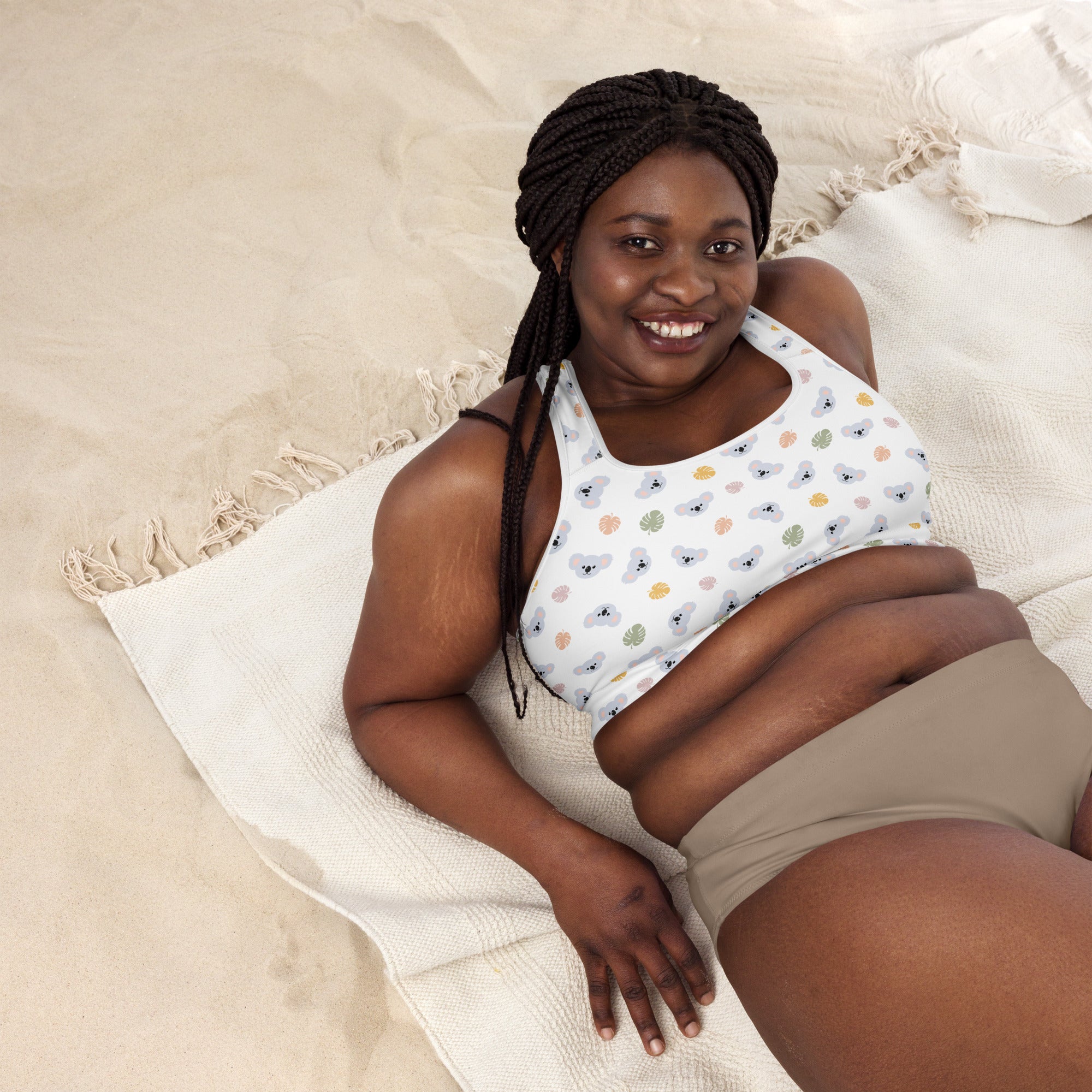 Women’s koala padded sports bra in white with pastel bear faces and leaves, buttery soft, supportive, and quick-dry