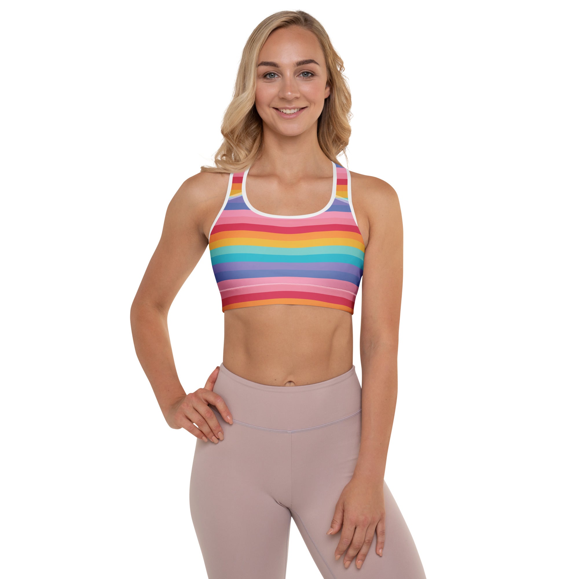 Women’s bright striped rainbow padded sports bra with white trim, buttery soft, supportive, and quick-dry fabric