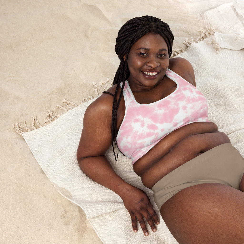 Women’s pink and white tie dye padded sports bra with black straps made from buttery soft quick-dry material