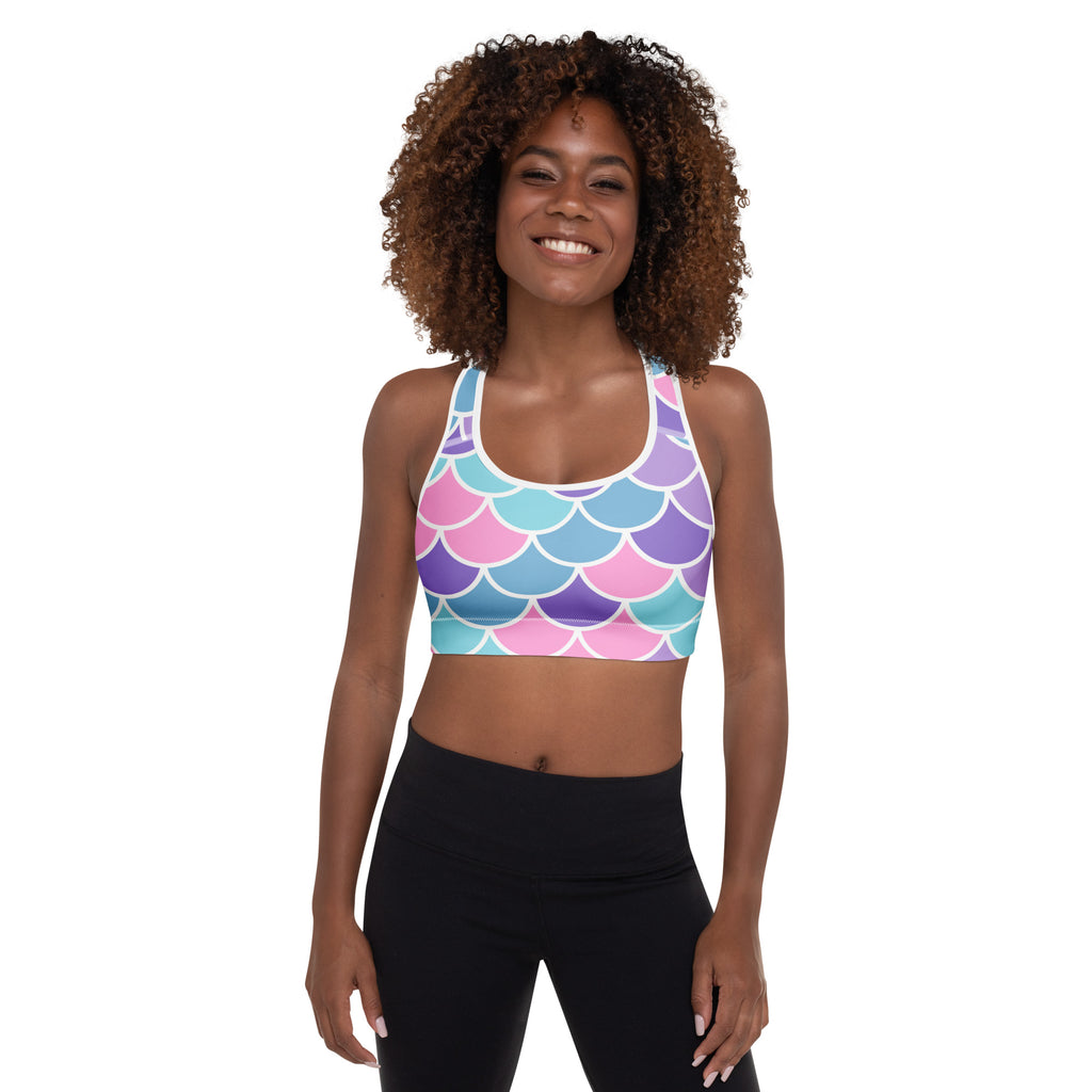 Women’s mermaid scale padded sports bra in pink purple teal iridescent pattern with white outlines, soft supportive quick-dry