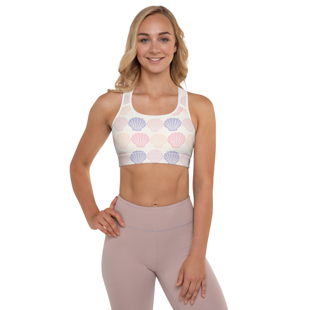 Women’s white sports bra with pastel pink and lavender seashell pattern buttery soft padded and quick-dry