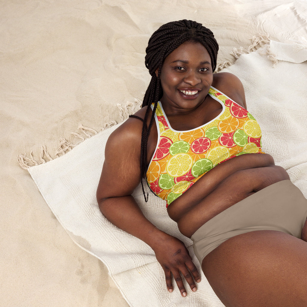 Women’s citrus slice padded sports bra in yellow orange green and red fruit pattern buttery soft quick-dry support