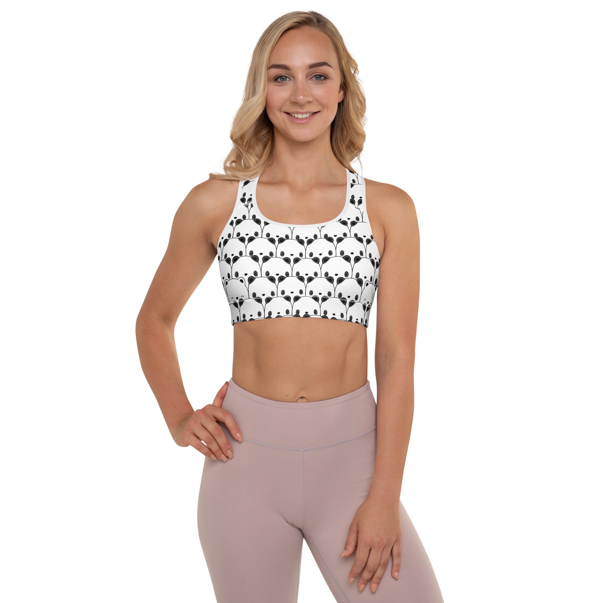 White women’s padded sports bra with black panda face pattern buttery soft supportive and quick dry material