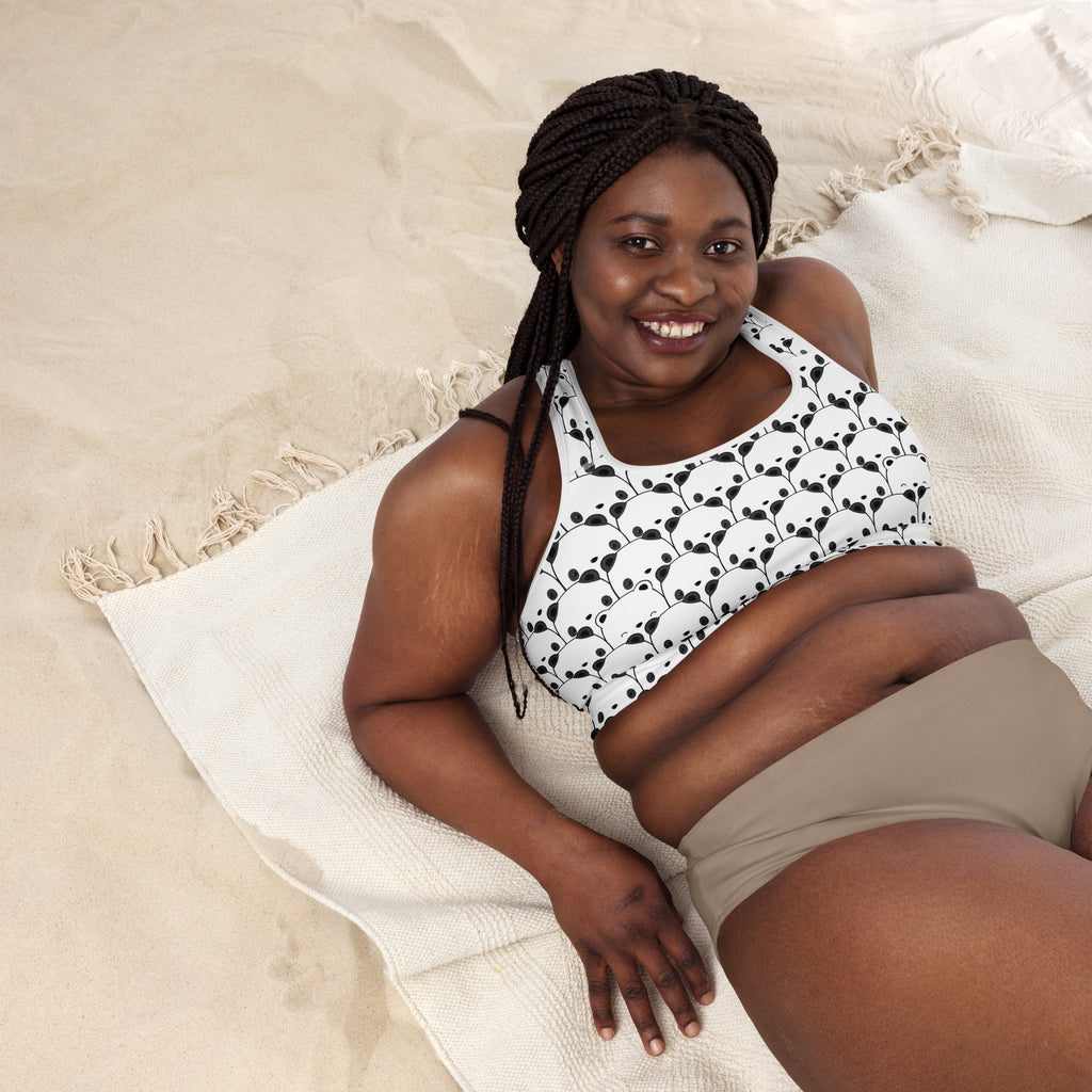 White women’s panda padded sports bra with black face pattern, buttery soft, supportive, and quick-dry material