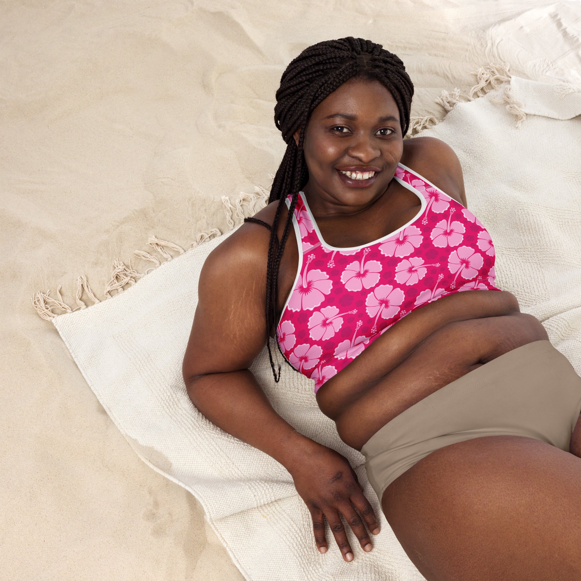 Women’s pink hibiscus floral padded sports bra with white trim buttery soft supportive and quick-dry material