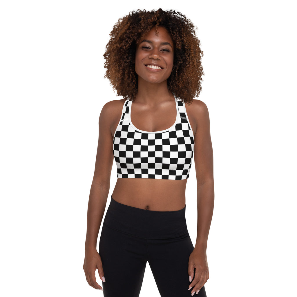 Women’s black and white checkerboard padded sports bra with buttery soft fabric and supportive racerback straps shown from back