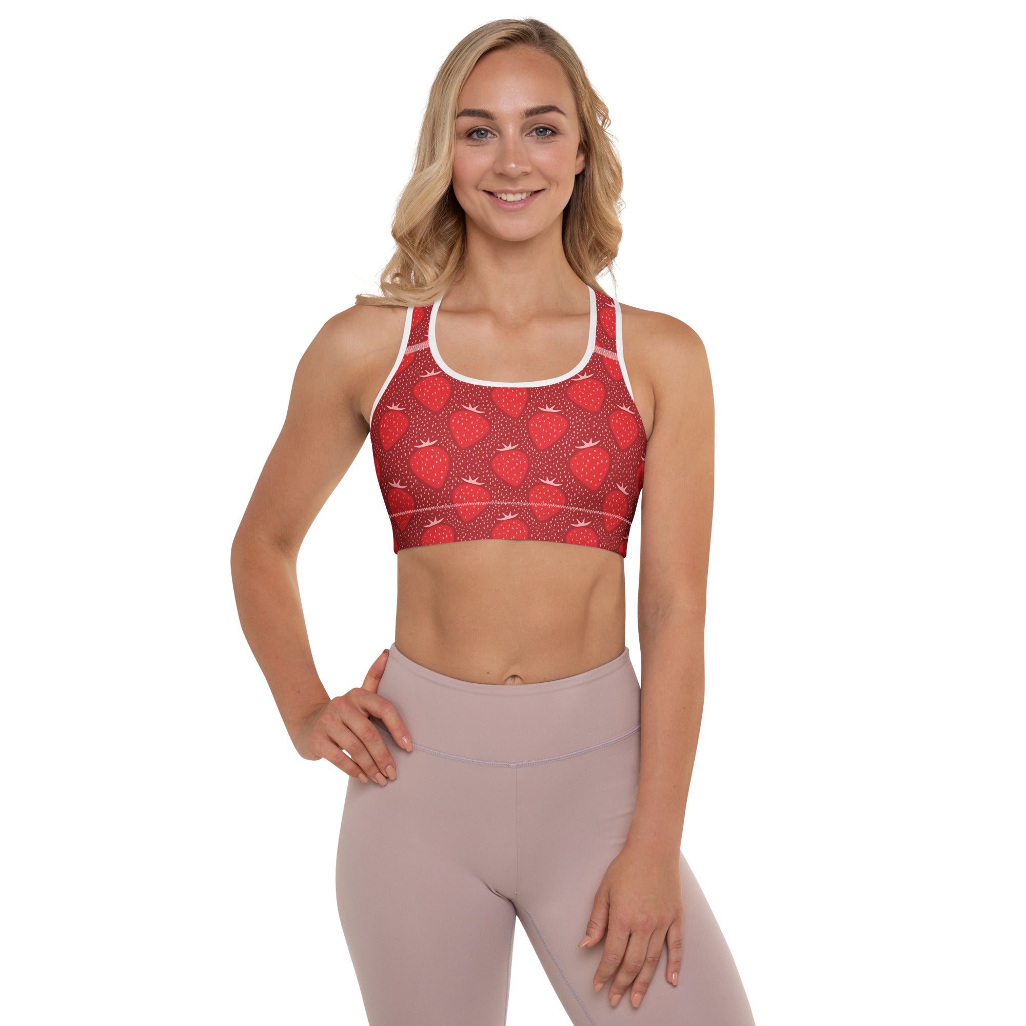 Women’s red strawberry padded sports bra with white trim buttery soft supportive and quick-dry material
