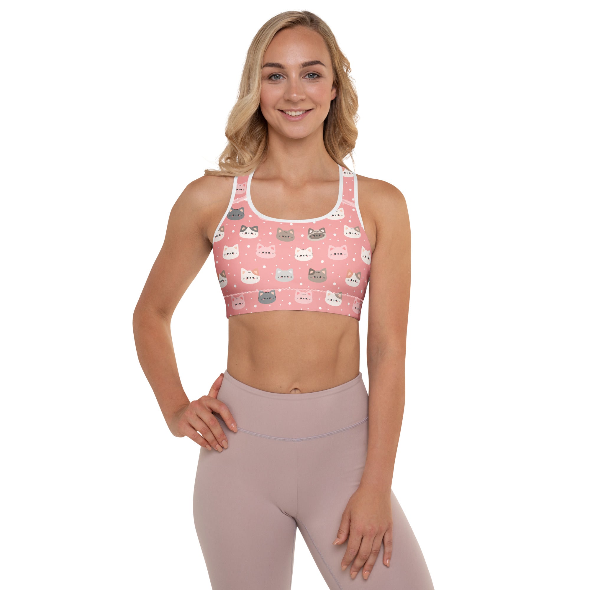 Women’s cute pink padded sports bra with playful multicolor cartoon cat faces and white polka dots, buttery soft quick-dry