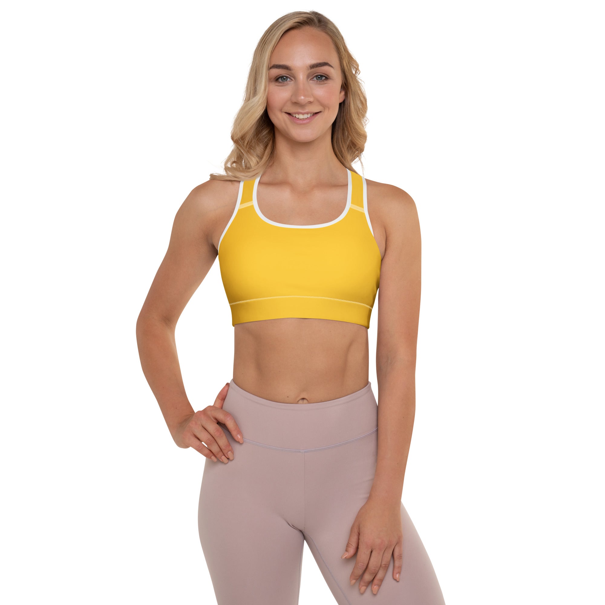 Women’s yellow padded sports bra with white trim featuring a seamless, buttery soft, supportive quick-dry design
