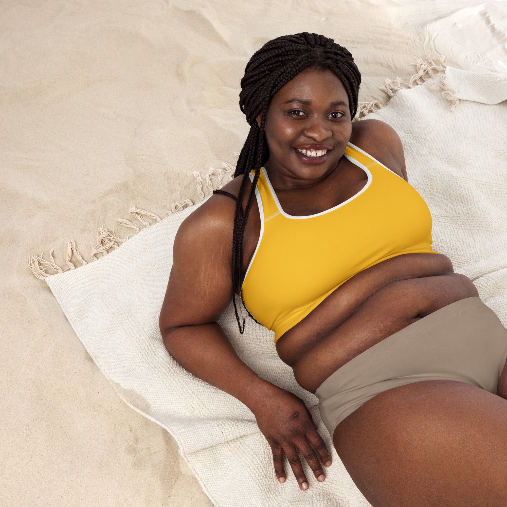 Women’s yellow padded sports bra with white trim buttery soft supportive and quick dry fabric for activewear