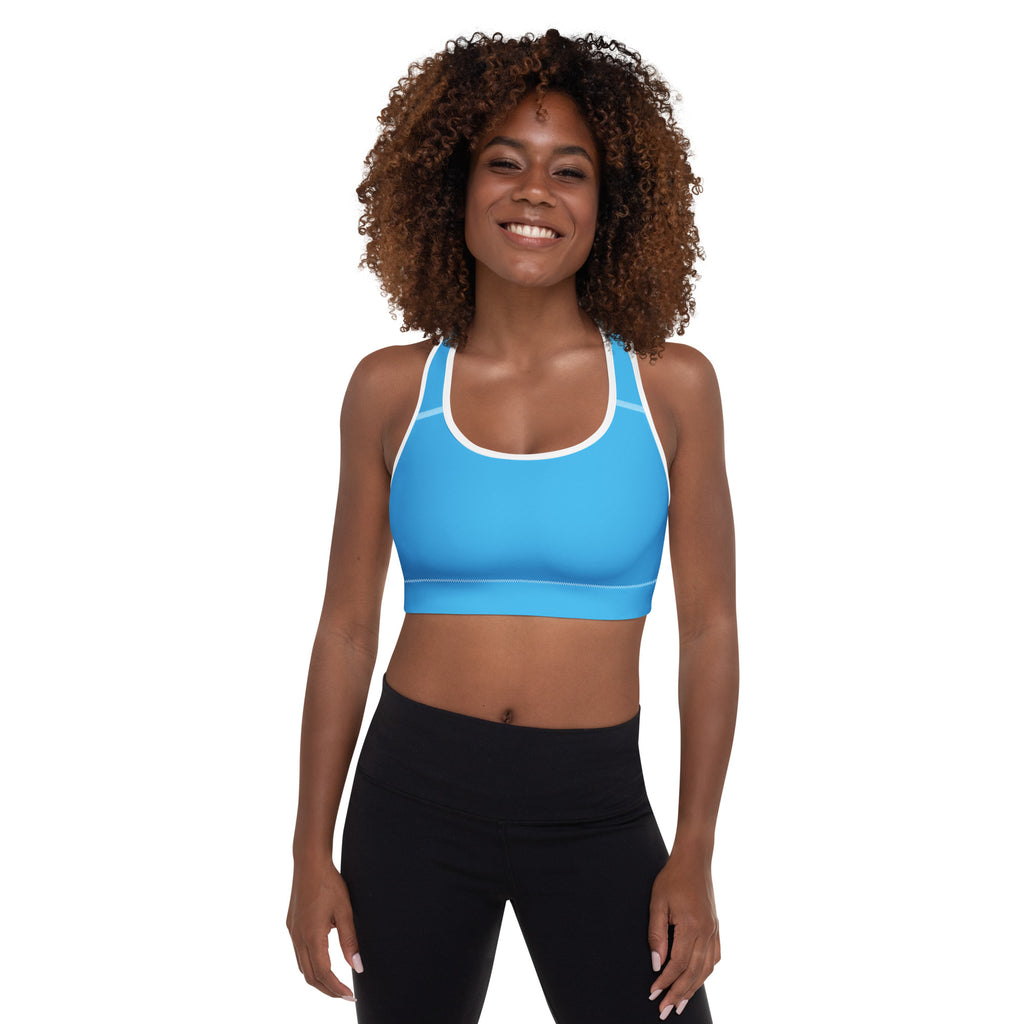 Women’s sky blue padded sports bra with white trim, buttery soft seamless design, supportive and quick-dry material