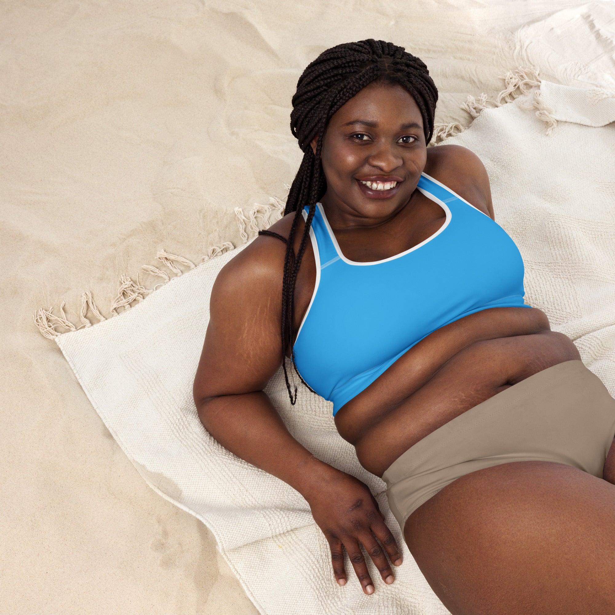 Women’s sky blue padded sports bra with white trim buttery soft supportive quick dry fabric for active wear