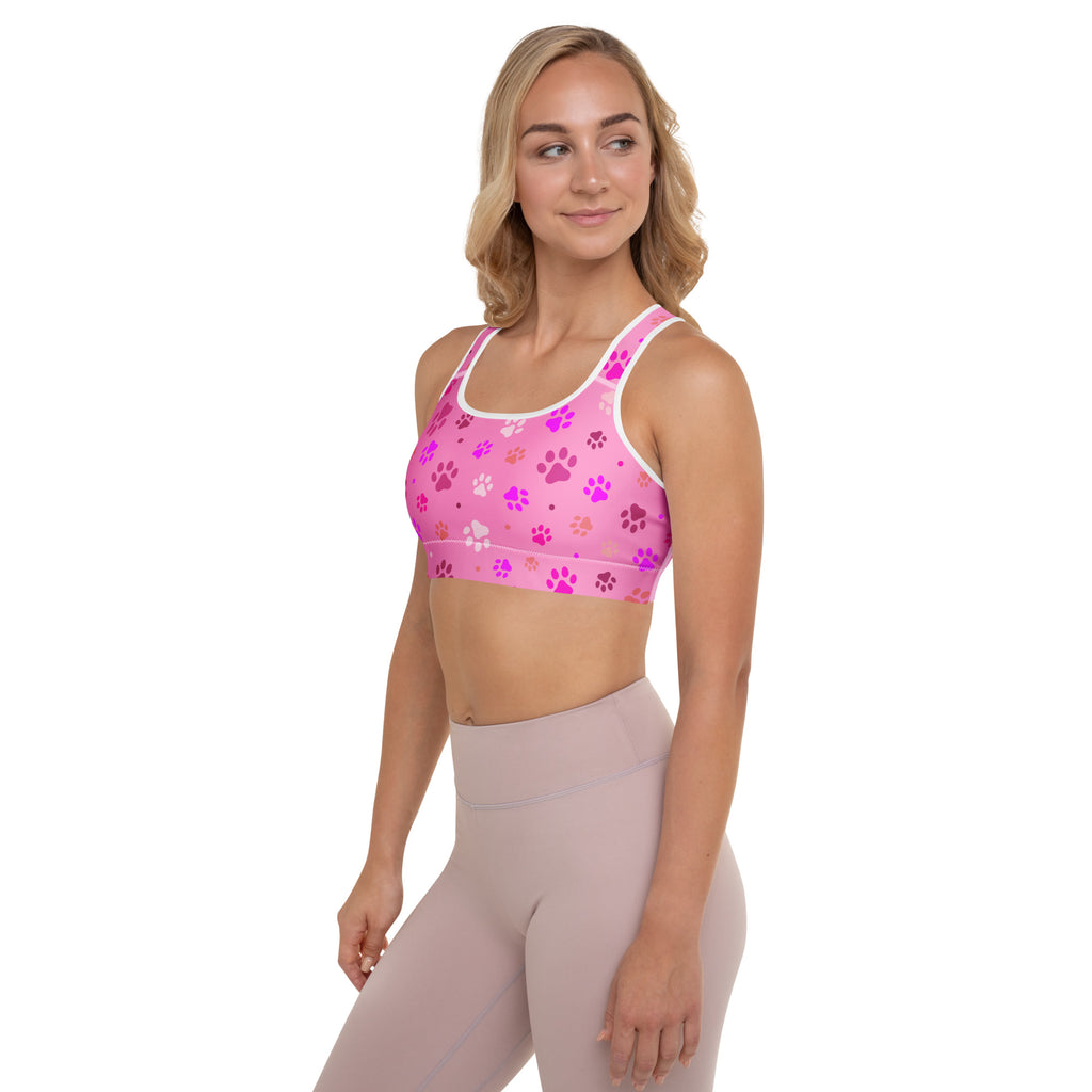 Women’s pink paw print padded sports bra with playful pattern, supportive straps, seamless design, buttery soft and quick-dry