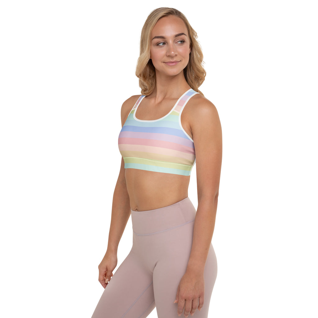 Women’s striped pastel rainbow padded sports bra with white trim buttery soft supportive and quick-dry material