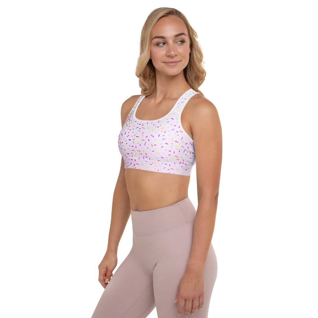 White women’s padded sports bra with colorful pink purple and gold sprinkle pattern buttery soft supportive and quick-dry