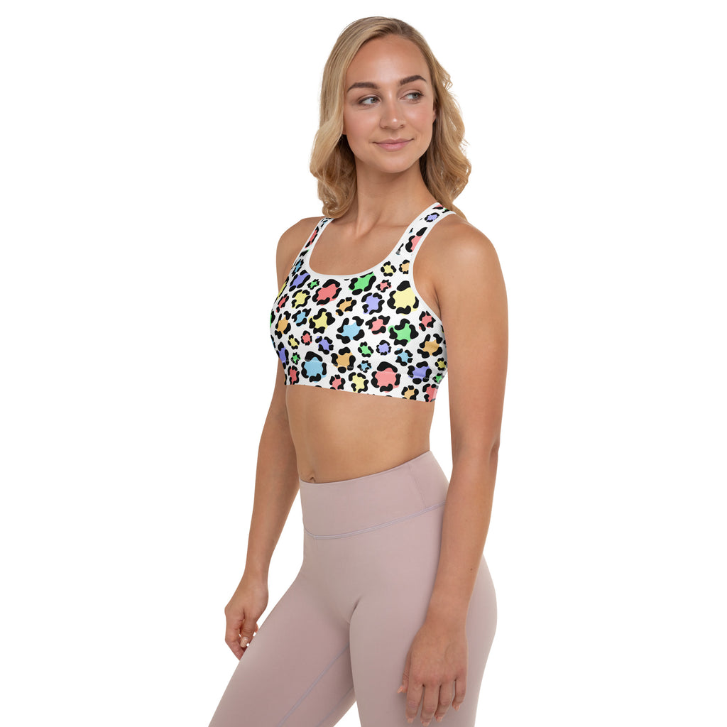White women’s colorful leopard padded sports bra with pastel pink blue green and yellow print buttery soft and quick dry