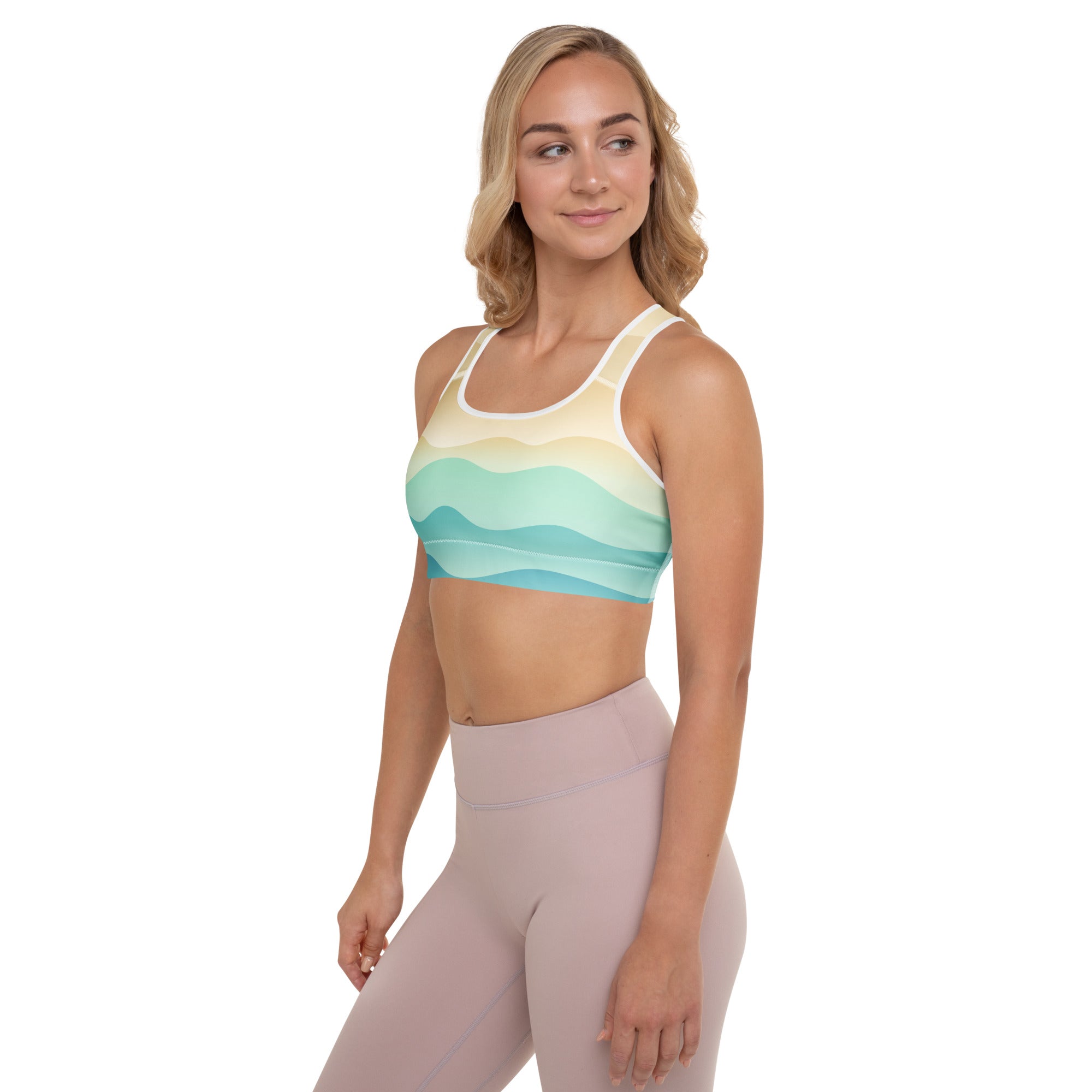 Women’s padded sports bra with buttery soft quick-dry fabric featuring pastel ocean wave gradient in cream mint green teal