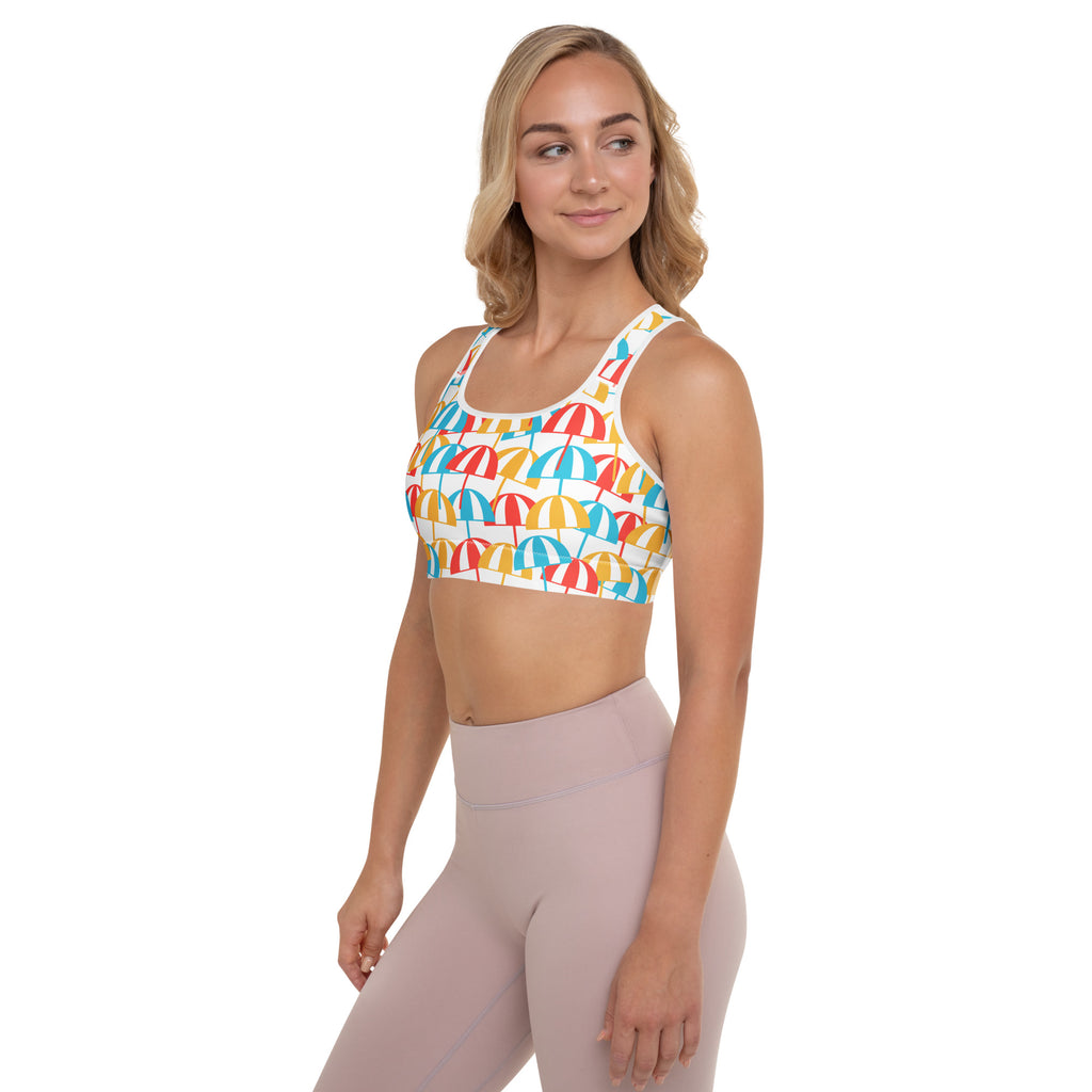 White women’s beach umbrella padded sports bra with colorful umbrella pattern, buttery soft, supportive, quick-dry material