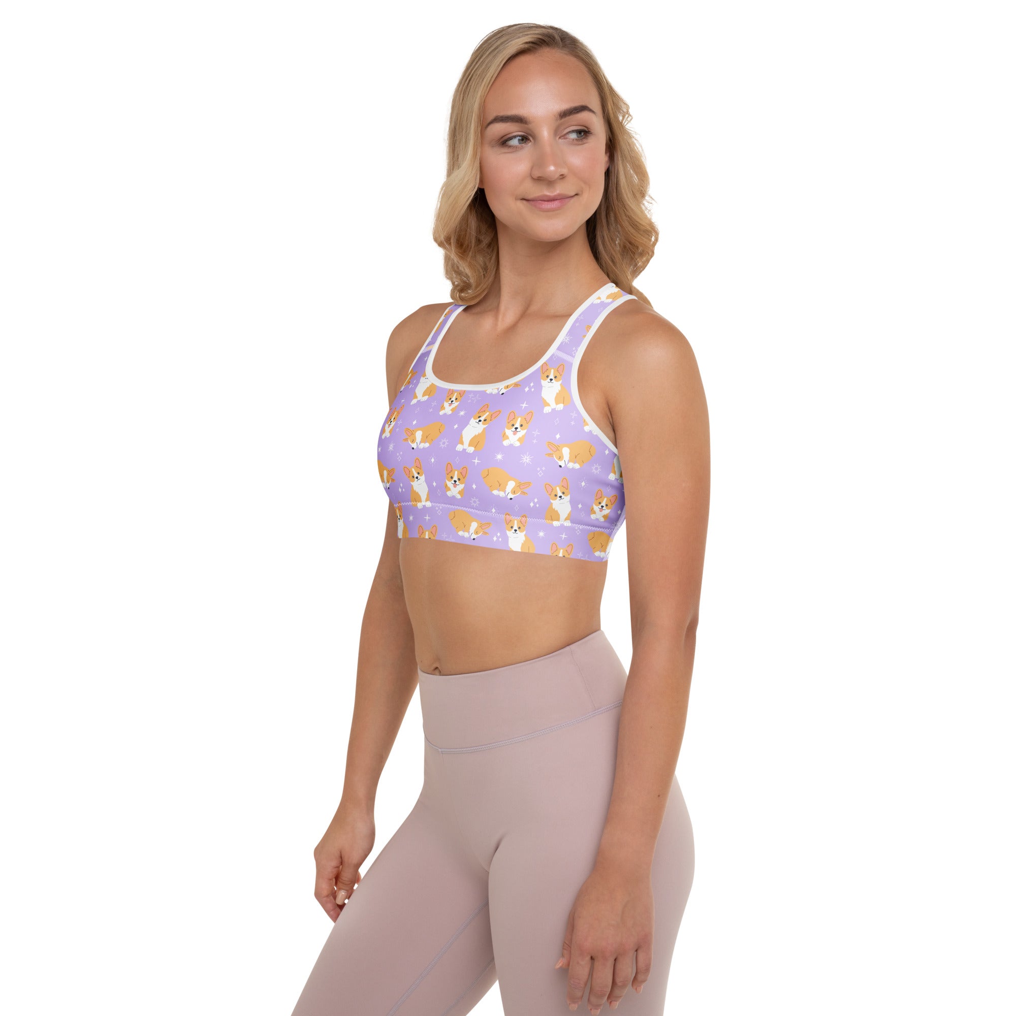 Women’s purple padded sports bra with orange and white corgi pattern buttery soft supportive quick drying