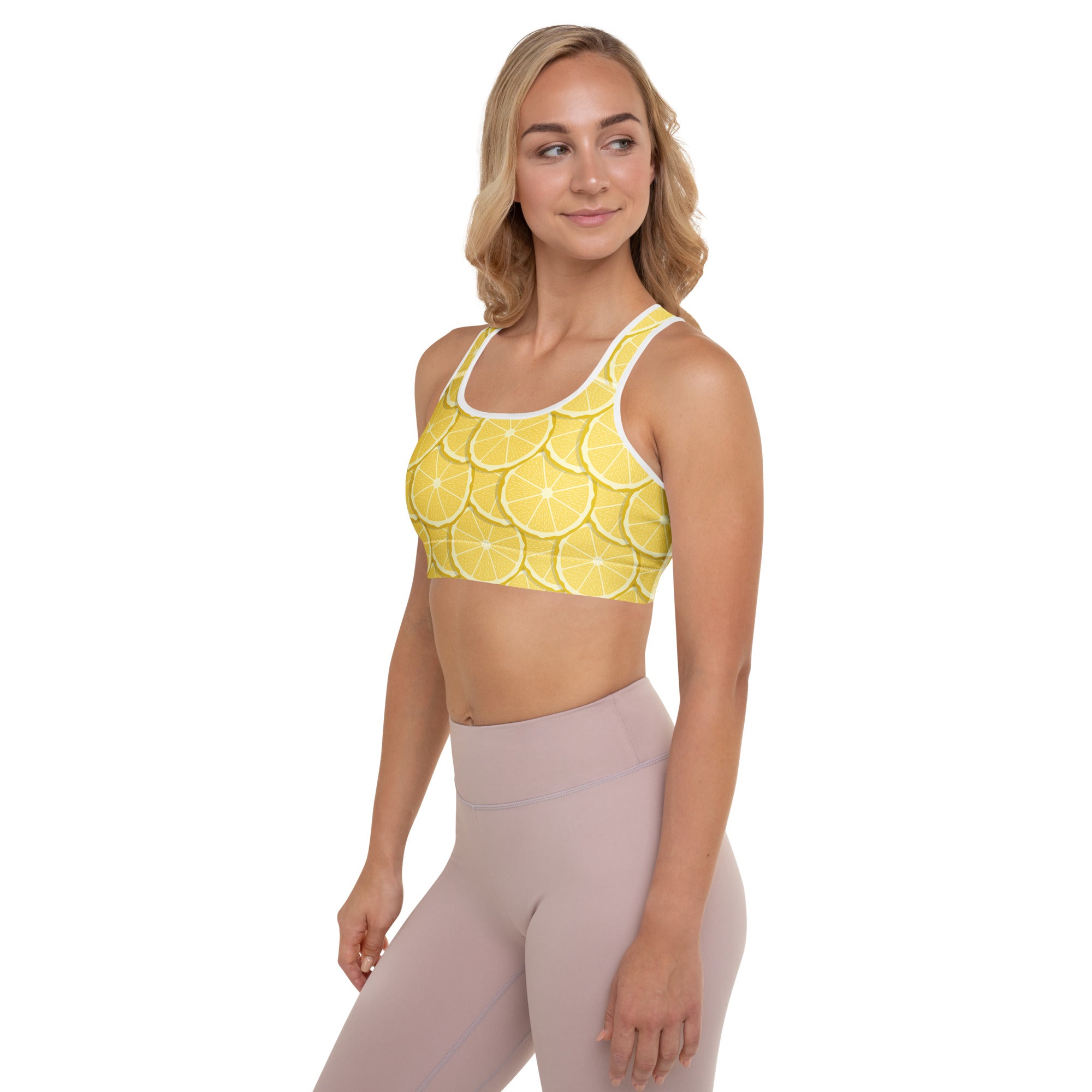 Women’s lemon slice print padded sports bra in yellow with white trim, buttery soft, supportive, and quick-dry