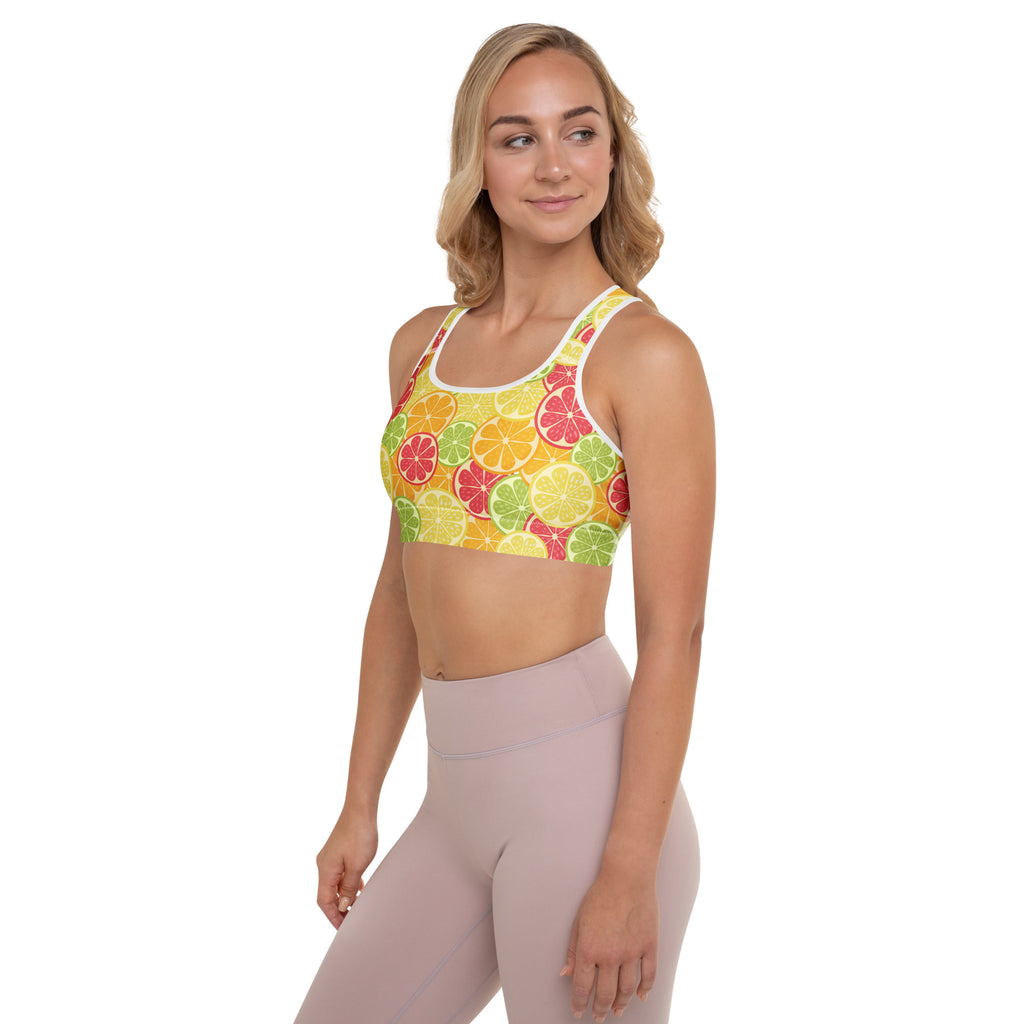 Women’s citrus slice padded sports bra in yellow with red and green fruit pattern buttery soft supportive quick-dry