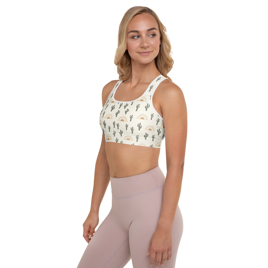 White padded sports bra with black cactus and sunburst patterns buttery soft supportive quick dry for women