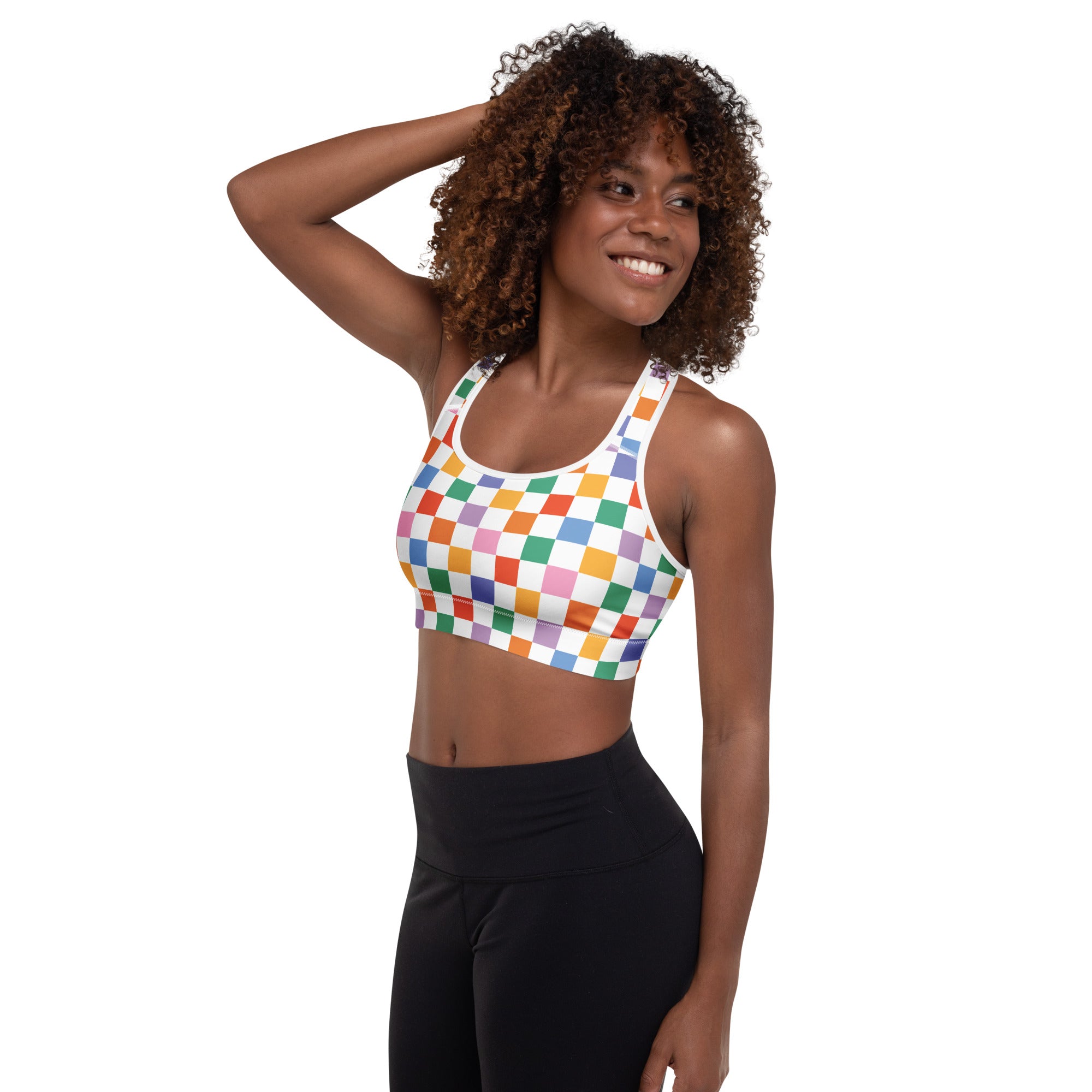 Women’s colorful checkerboard padded sports bra with vibrant rainbow pattern white straps buttery soft quick dry