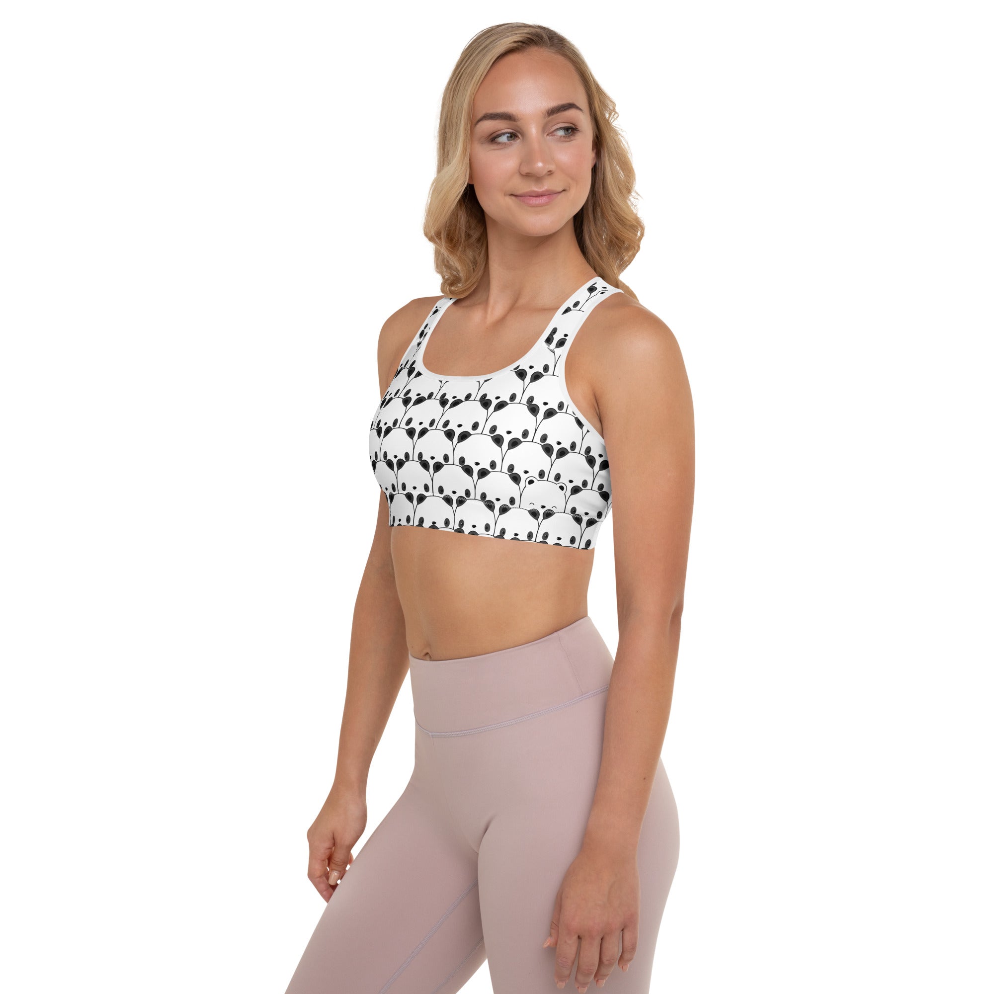 Women’s white padded sports bra with black panda face pattern buttery soft supportive and quick-dry material