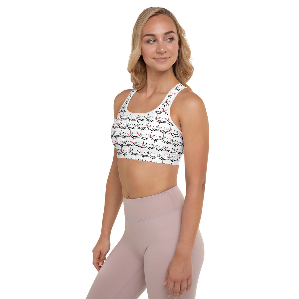 White padded sports bra with black and pink cartoon cat print, buttery soft, supportive, and quick-dry for women