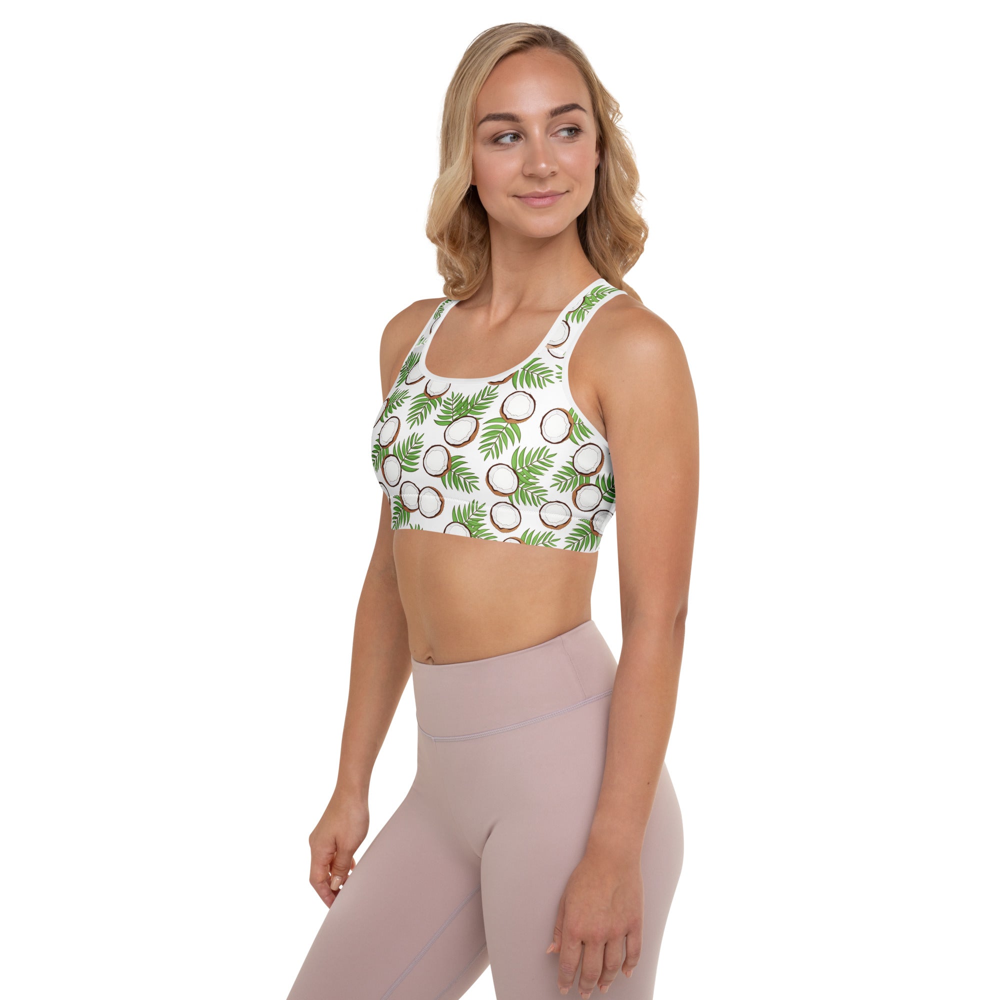 White padded sports bra with tropical coconut and palm leaf pattern, buttery soft, supportive, and quick-dry fabric