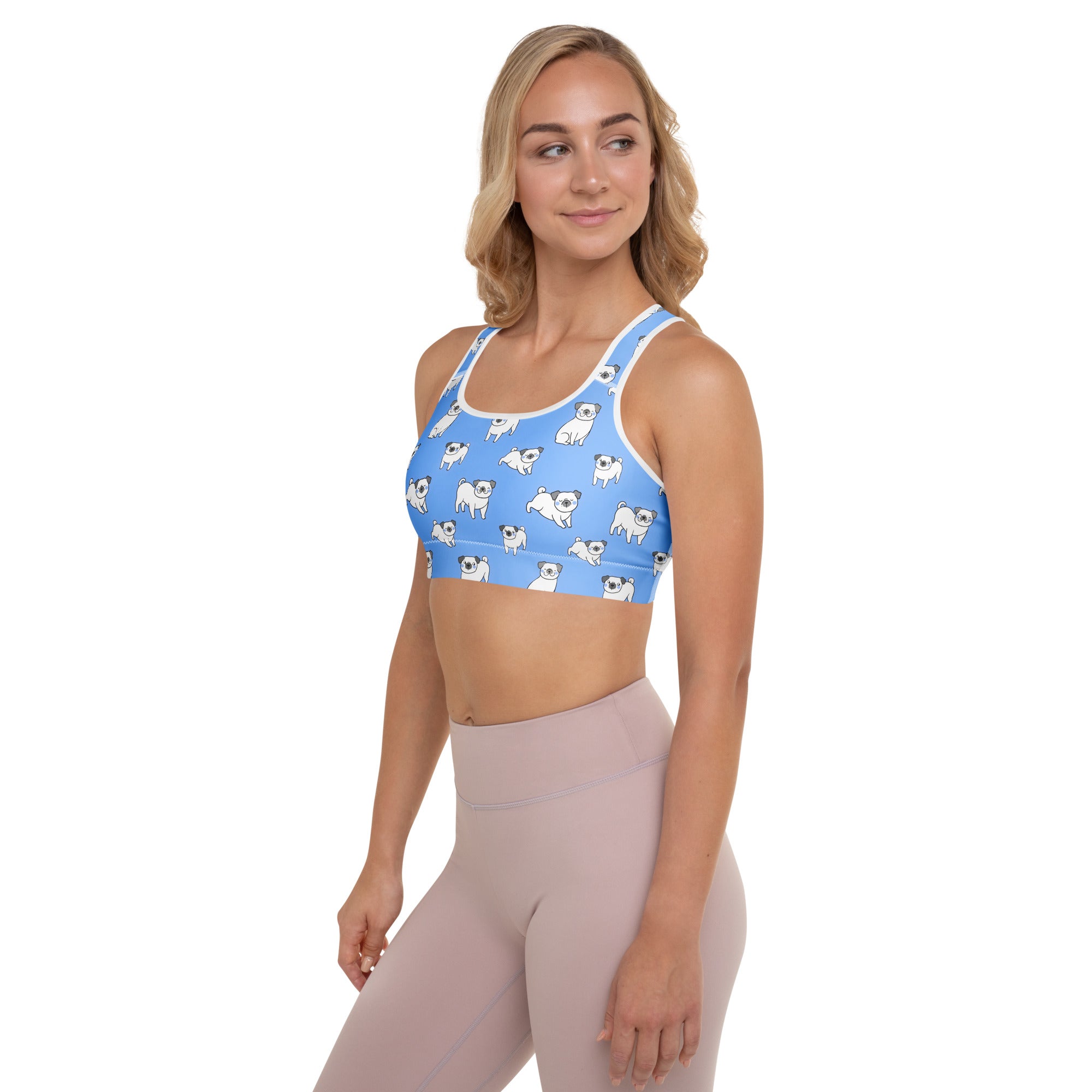 Women’s blue padded sports bra with white pug prints and white trim buttery soft supportive quick-dry fabric