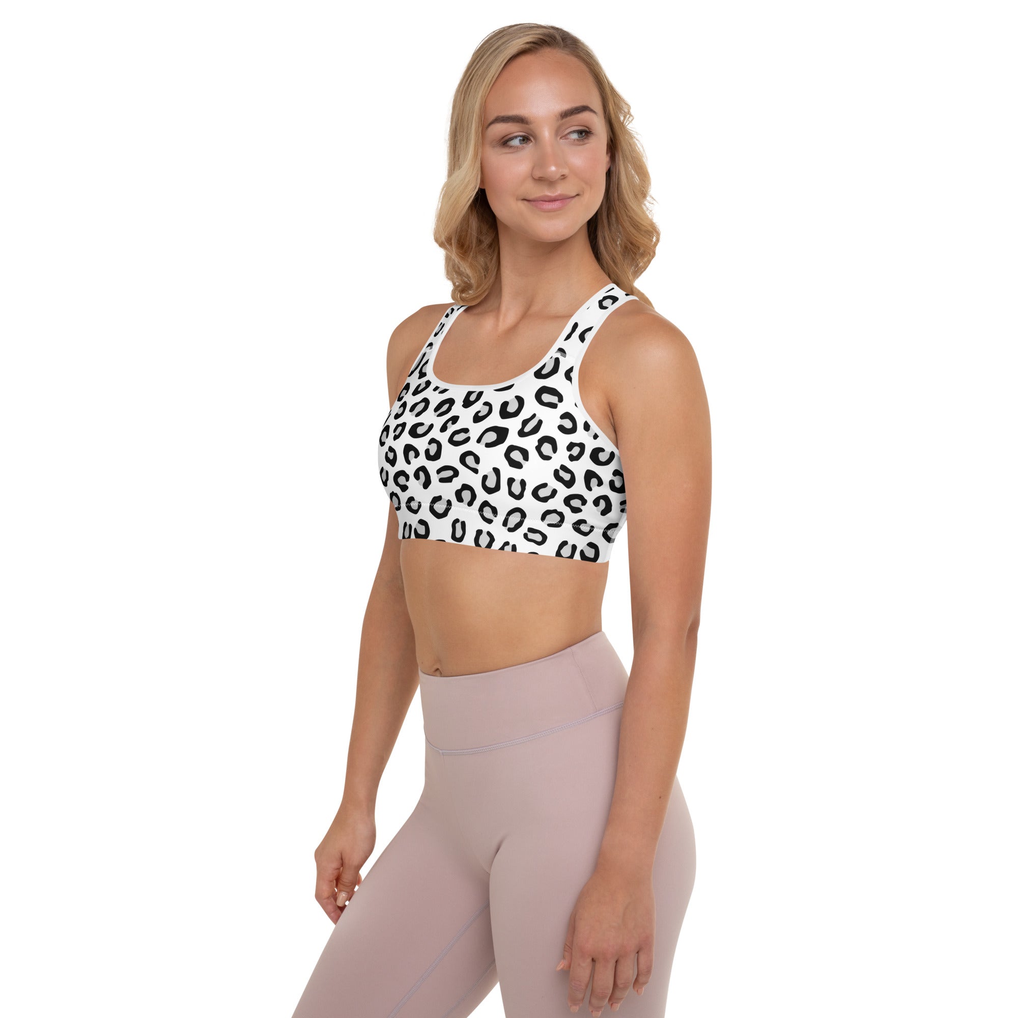 White sports bra with black leopard print pattern padded buttery soft supportive quick drying for women