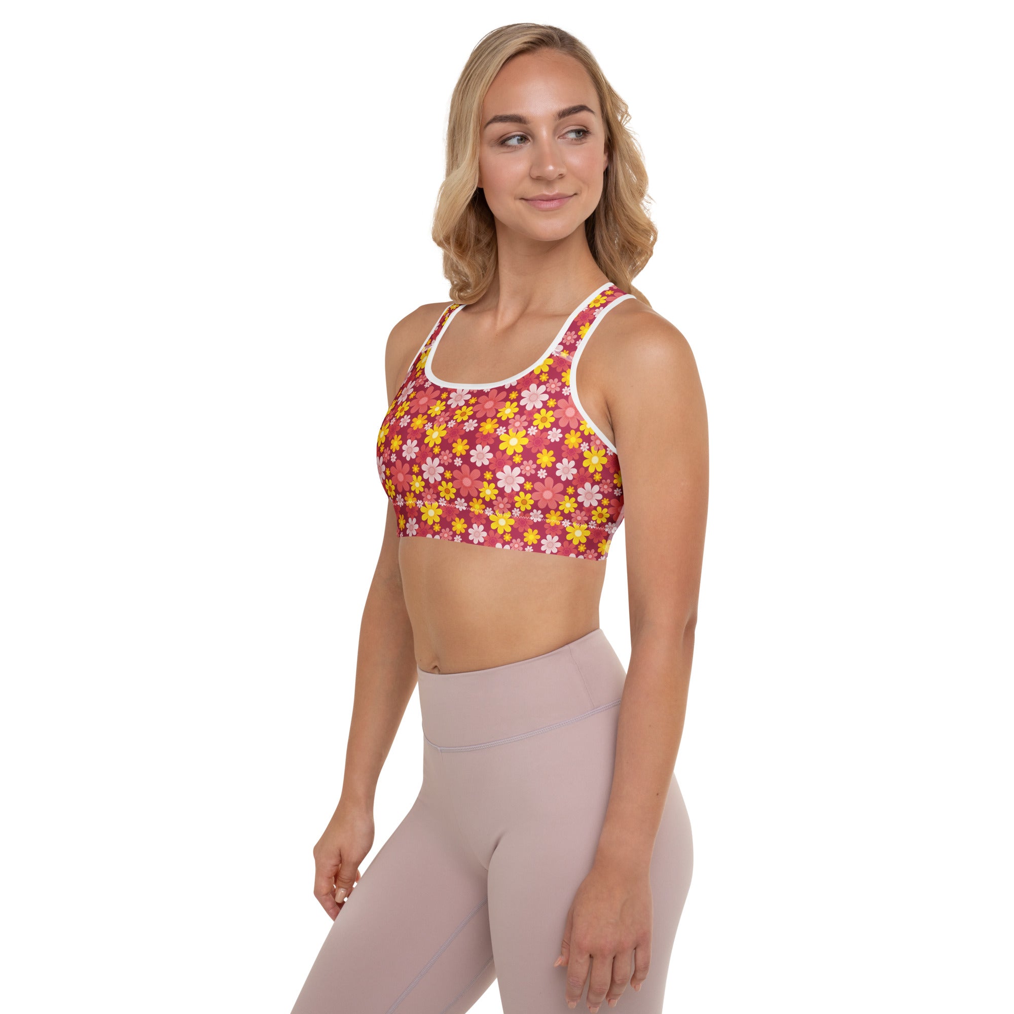 Women’s red floral padded sports bra with vibrant pink and yellow print, white trim, buttery soft and quick-dry fabric