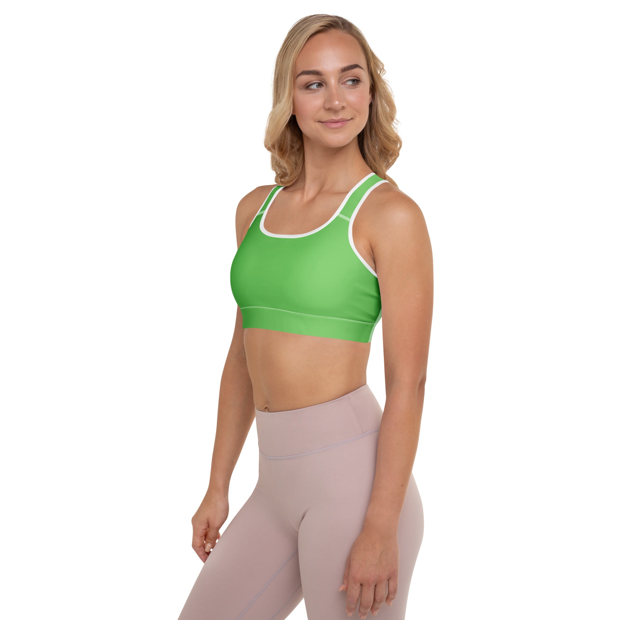 Bright green women’s padded sports bra with white trim buttery soft supportive and quick-dry fabric