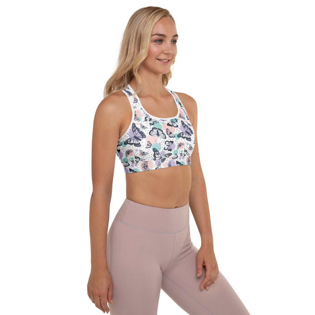 White women’s butterfly padded sports bra with vibrant blue purple pink pattern buttery soft supportive quick dry