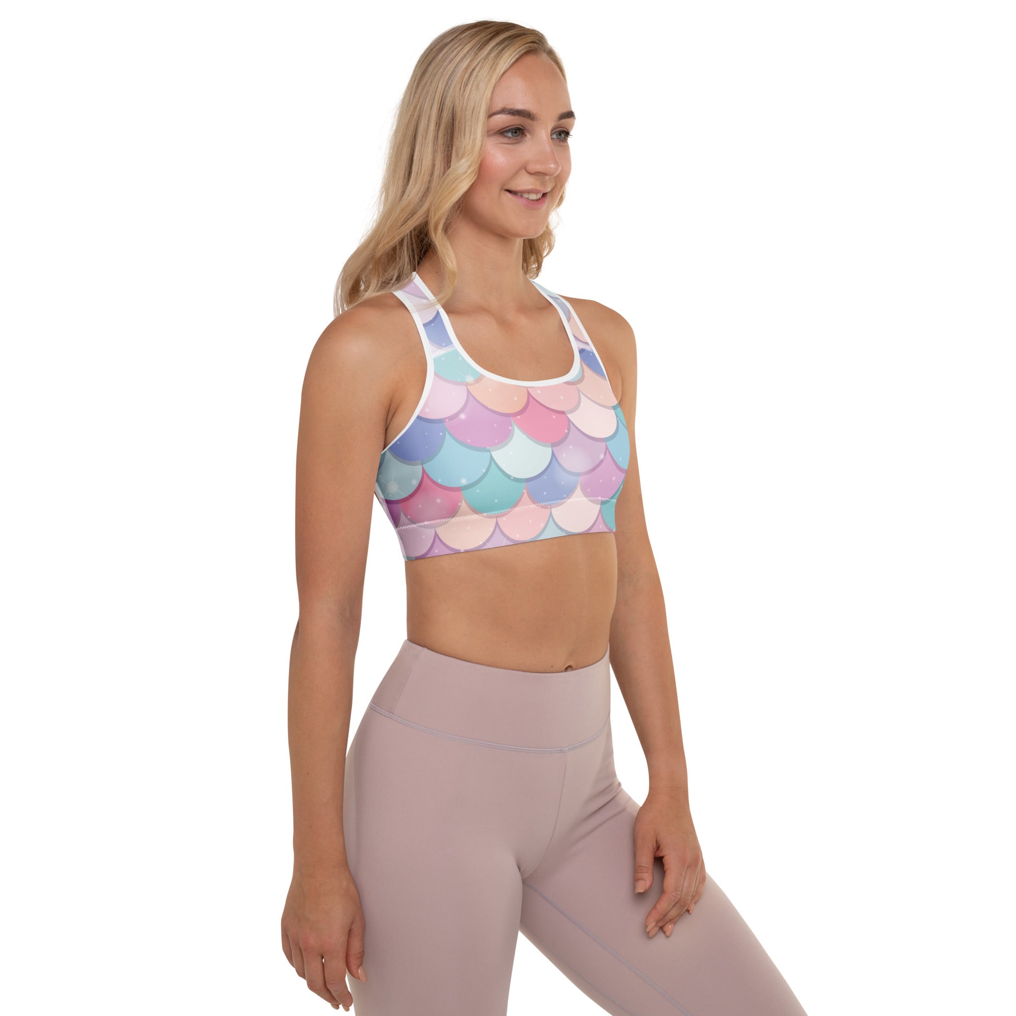 Women’s pastel-colored rainbow mermaid scale padded sports bra with white trim buttery soft supportive quick-dry