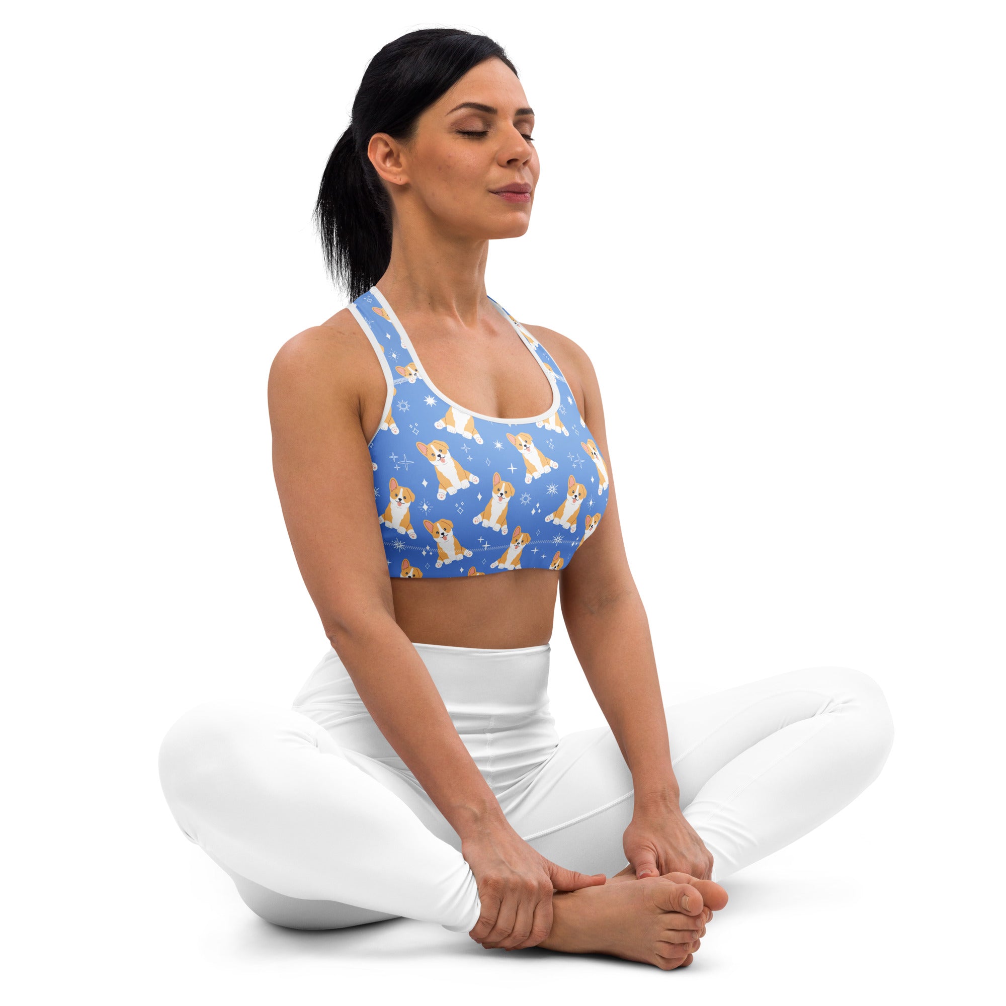 Women’s blue corgi dog padded sports bra with tan dog pattern and white stars buttery soft supportive quick dry