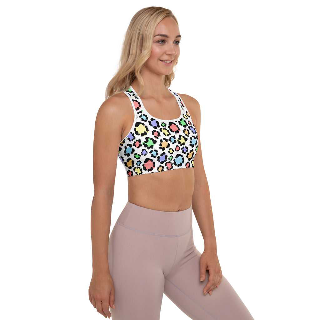 White padded sports bra with colorful pastel leopard print and black outlines buttery soft supportive quick dry