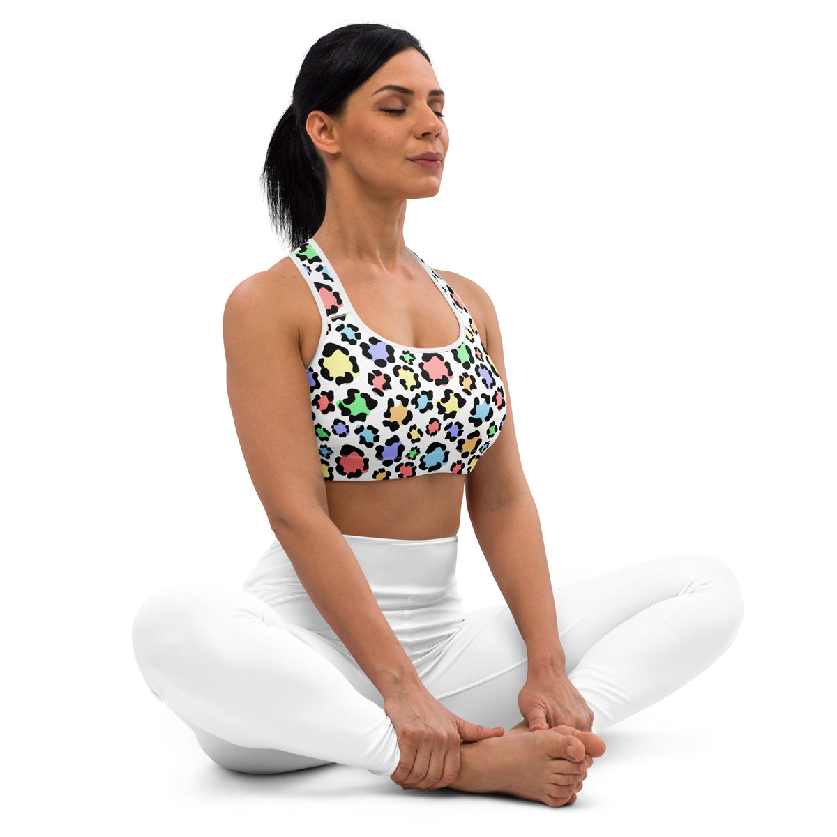 White women’s sports bra with colorful leopard print padded design buttery soft supportive quick-dry fabric