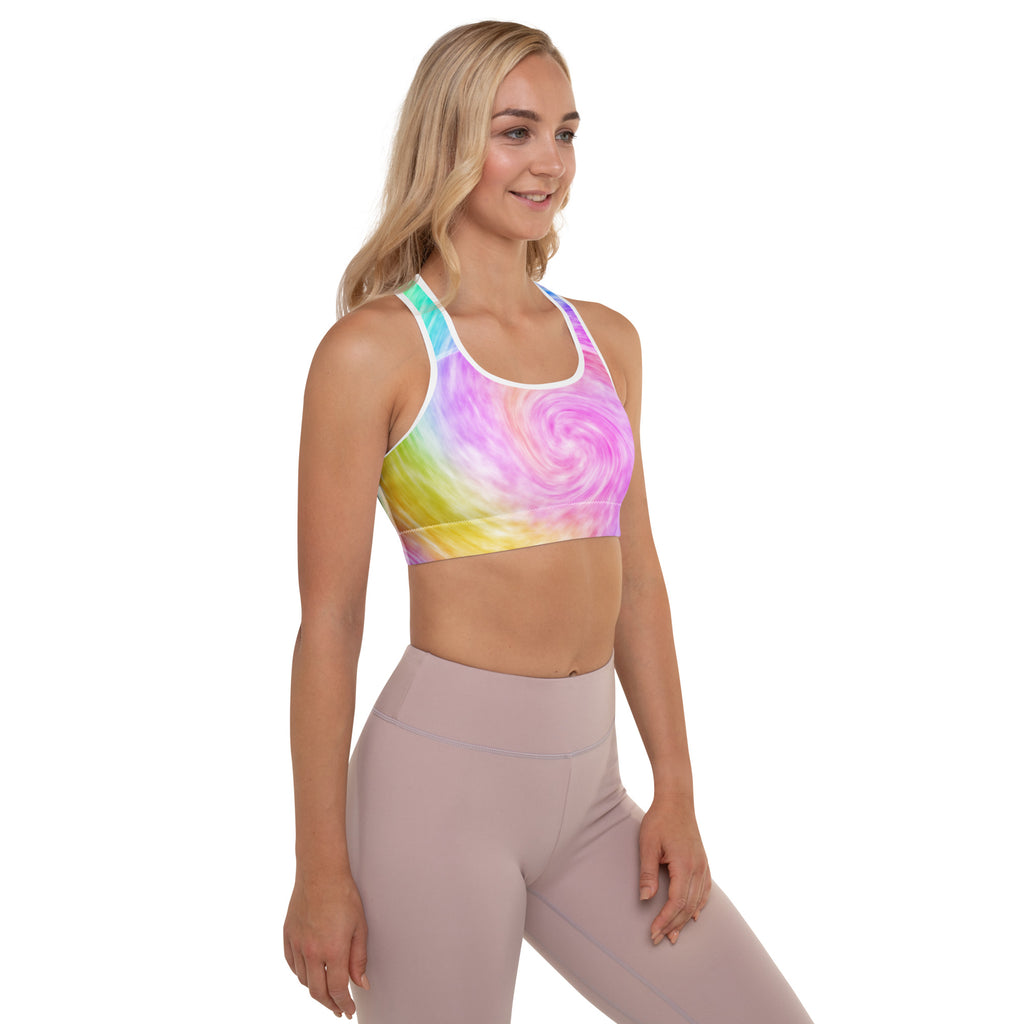 Women’s rainbow swirl patterned padded sports bra with white trim buttery soft supportive and quick dry