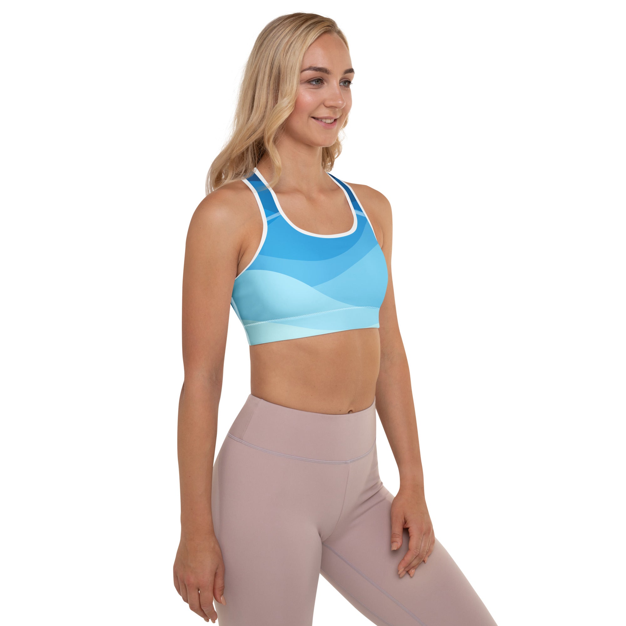 Women’s blue waves padded sports bra with gradient blue wave pattern white trim supportive quick-dry fabric